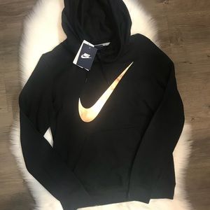 black nike sweatshirt with gold swoosh